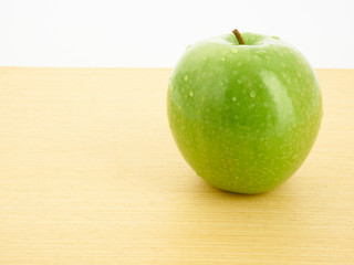 green apple on a plate