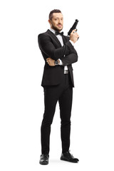 Obraz premium Man in a suit holding a gun