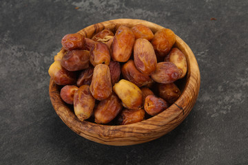 Sweet tasty dry dates in the basket