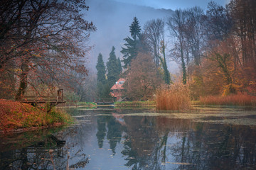 Papuk, Croatia, 31.10.2018. - Lake at Jankovac hiking spot at Nature Park Papuk in foggy autumn morning