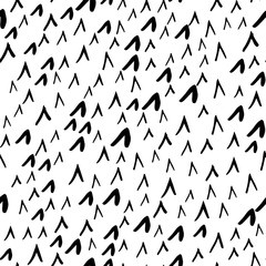 Seamless pattern with sharp corner abstract form in black and white. Hand drawn triangle objects in chaotic composition. Vector illustration for textille print, fabric, wrapping paper.