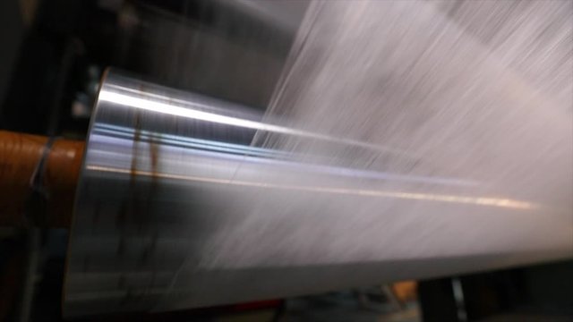 Nonwoven fabric production, polyester production in a modern factory. Nonwoven fabrication process