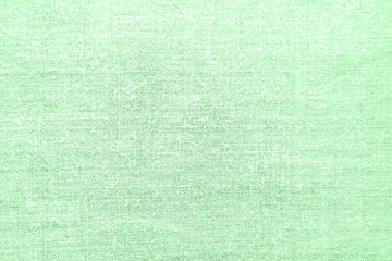 Homespun linen fabric in color of neo mint. Abstract textile background.