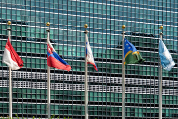 flags outside united nations building in new york