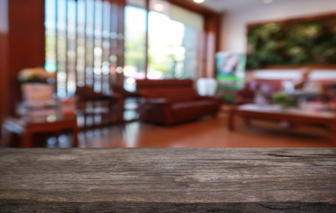 Wood Table Top in Blur Background room interior with empty copy space.