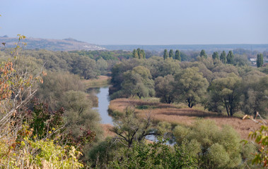 Fototapeta na wymiar river floodplain view from the hill in autumn time. Kupyansk, Ukraine