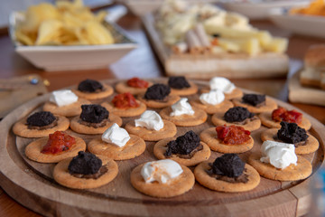 Pate on crackers with blurry background