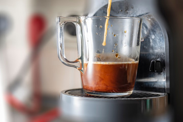 Coffee machine is making coffee