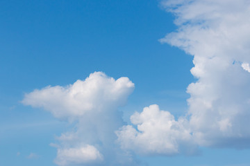 white clouds in the blue sky during