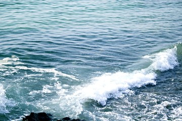 Water surface with small waves moving in the direction of the wind. movement of water surface ripples and waves. sea eater background 
