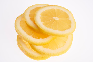Naklejka na ściany i meble slice of lemon isolated on white background