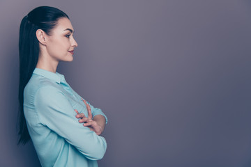 Photo of cheerful cute attractive office employee staring at work process with her arms crossed smiling candidly isolated over grey color background