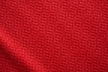 Poster Rode sportkleding stof voetbal jersey textuur close-up © Piman Khrutmuang