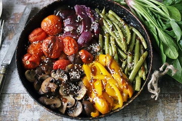 Set of vegetables baked in a pan. Healthy diet. Vegan food.