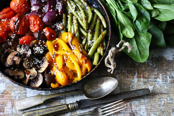 Set of vegetables baked in a pan. Healthy diet. Vegan food.