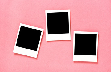 Photo frames pink background Flat lay