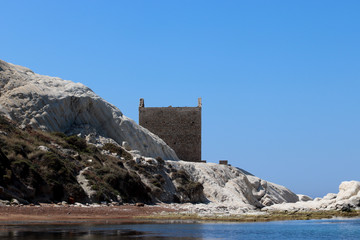 old abandoned fishing cabin at Punta Bianca beach Sicily