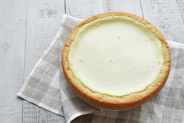 homemade cottage cheese pie on linen towel