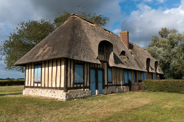 view of the historic Moulin de Pierre miller's house in Hauville in Normandy