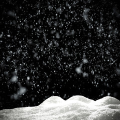 Winter snow flakes with free space for your product. Black background to mount your picture through the screen