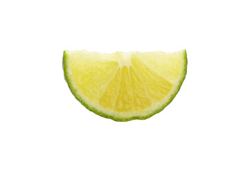 Close up cut slice of green lime over white