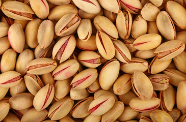 Background of fresh roasted pistachio nuts