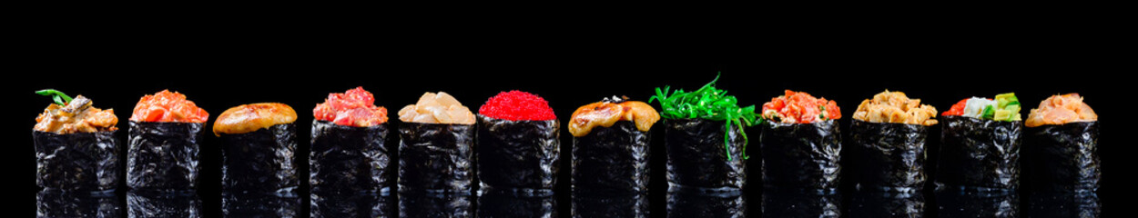 sushi set gunkans on a black background © smspsy