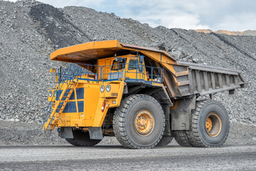 Quarry truck carries coal mined.