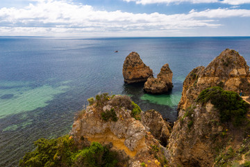 Algarve beach coast and rocks on the ocean in Portugal