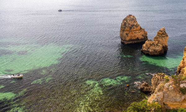 Algarve beach coast and rocks on the ocean in Portugal