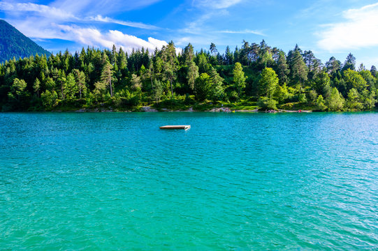 Urisee - clear blue water of Laki Uri at Reutte in Tirol, Austria