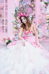 Closeup portrait of Calavera Catrina in pink dress. Sugar skull makeup. Dia de los muertos. Day of The Dead. Halloween