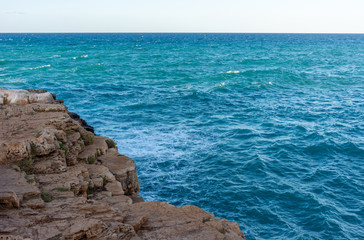 View of rocky coast and blue sea
