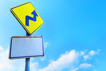 Sign pole post on blue sky. yellow traffic sign with copy space