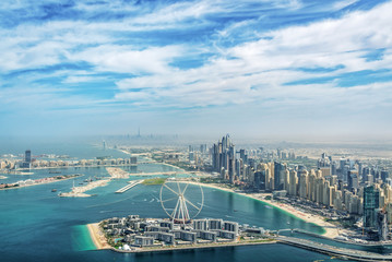 Aerial view of Dubai Marina skyline with Dubai Eye ferris wheel, United Arab Emirates