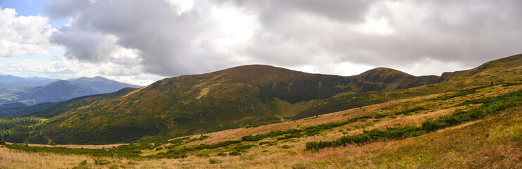 Naklejka premium panorama landscape with mountains and clouds
