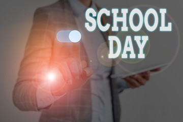 Writing note showing School Day. Business concept for starts from seven or eight am to three pm get taught there Woman wear formal work suit presenting presentation using smart device