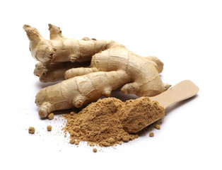 Ginger roots and powder with wooden spoon isolated on white background