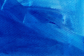 Blue watercolor texture background. Hand drawn ultramarine ombre, brush gradient strokes. Indigo painting.