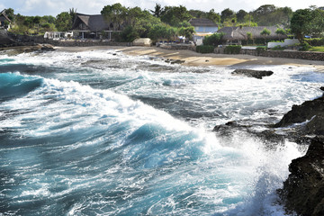 Big waves at Sandy Bay Beach in Nusa Lembongan Island, Bali, Indonesia
