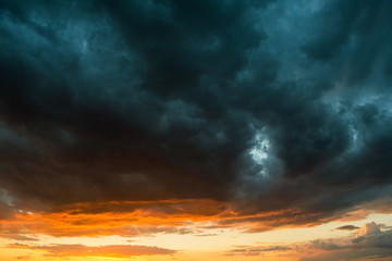 Storm clouds at sunset in bright colors