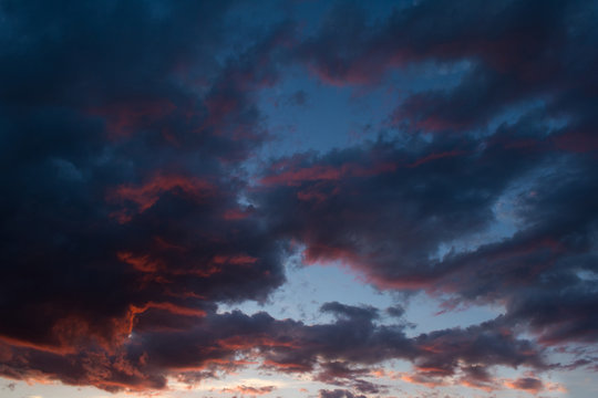 Storm clouds at sunset in bright colors