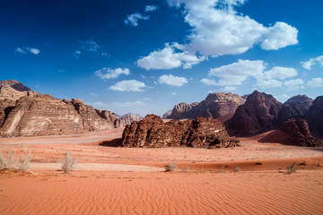 Fototapeta na wymiar Panoramic view of the mountain rocks at Wadi Rum desert, southern Jordan