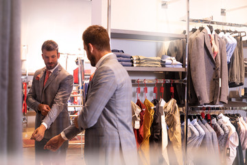 Man trying on suit