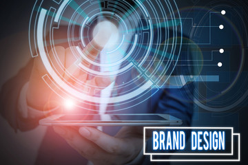 Text sign showing Brand Design. Business photo showcasing visual elements that make up the corporate or brand identity Male human wear formal work suit presenting presentation using smart device