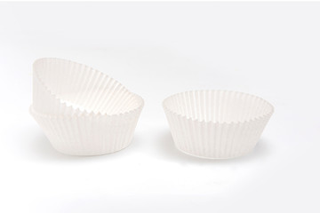 White cupcake paper cups on white background