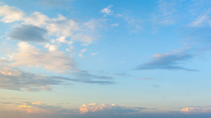 Clouds in the blue sky. Landscape image of the sky and clouds at sunset in the evening.