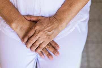 Close up of wrinkled on elderly Asian woman hands skin