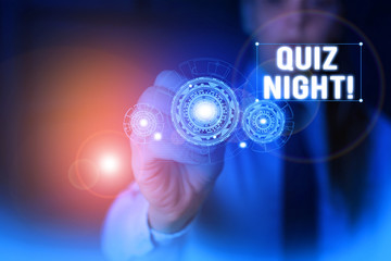 Text sign showing Quiz Night. Business photo showcasing evening test knowledge competition between individuals Woman wear formal work suit presenting presentation using smart device