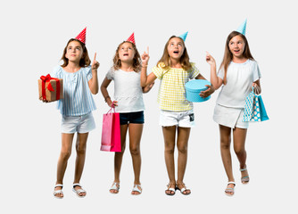 Set of Little girl at a birthday party holding a gift bag standing and thinking an idea on grey background